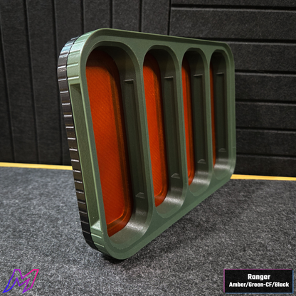 MATERIUM Vanguard Catch Ranger colorway side profile, green carbon fiber ribbed exterior with amber resin slot glow