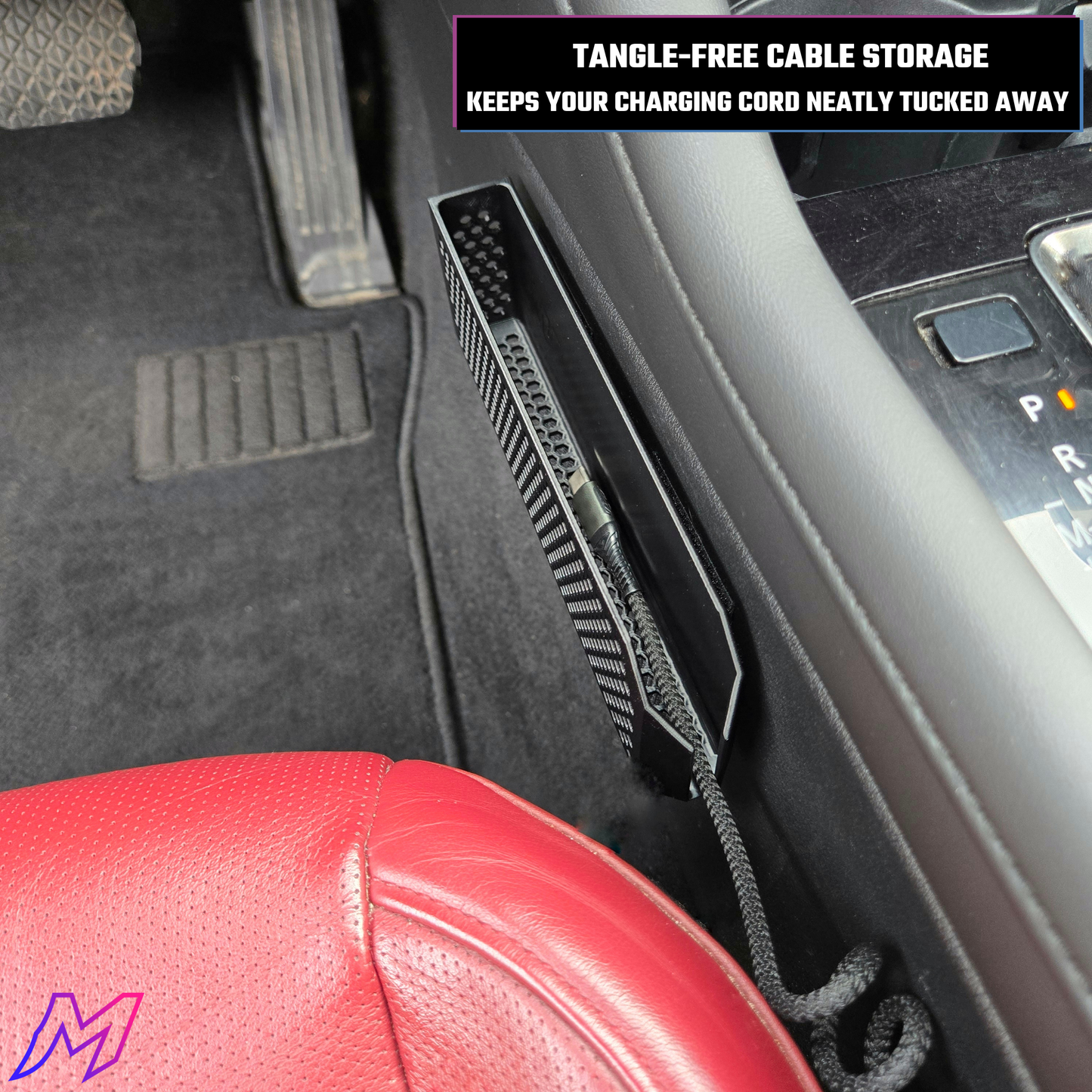 Car interior with tangle-free cable storage system and charging cord neatly tucked away.
