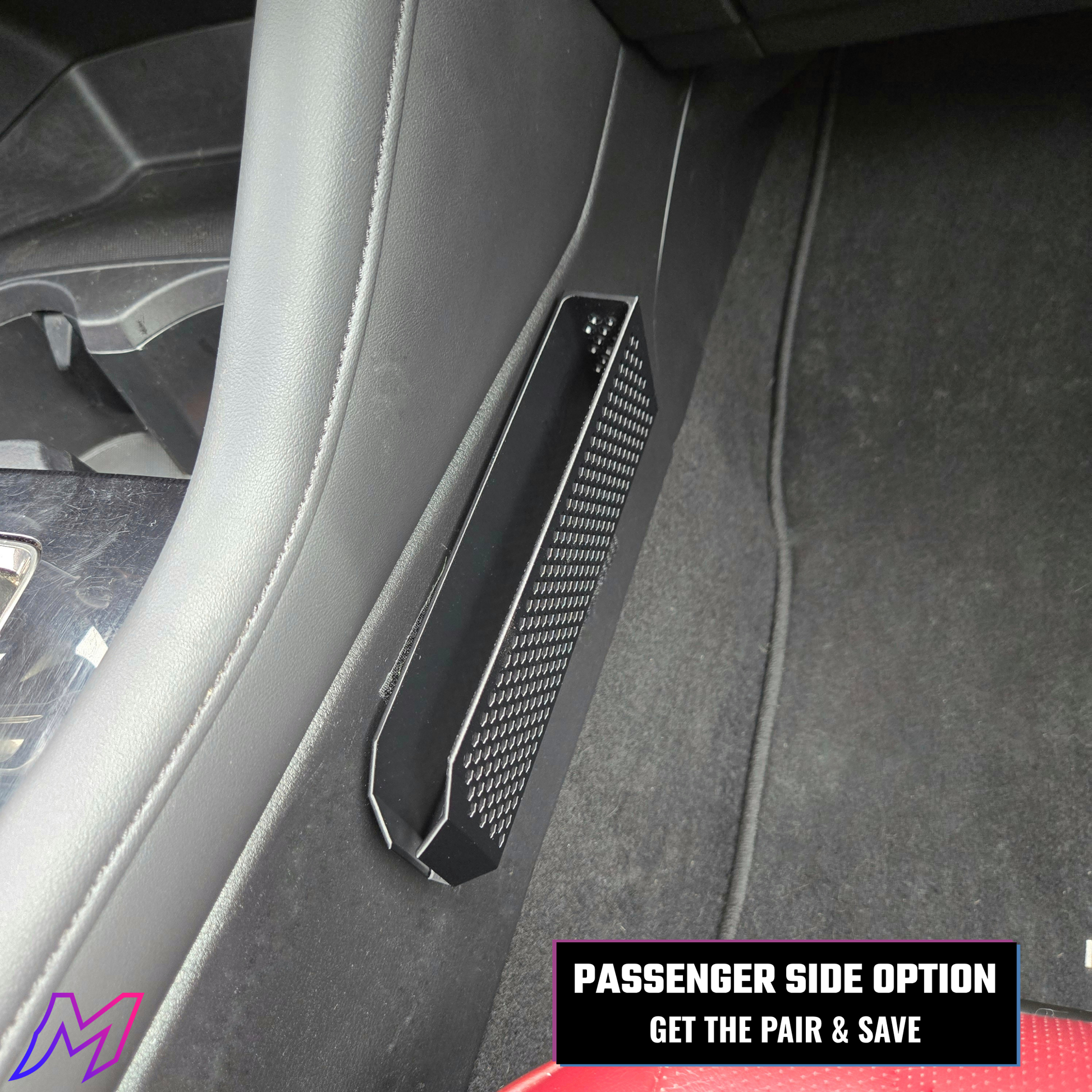 Car interior with a carbon fiber patterned panel on the passenger side