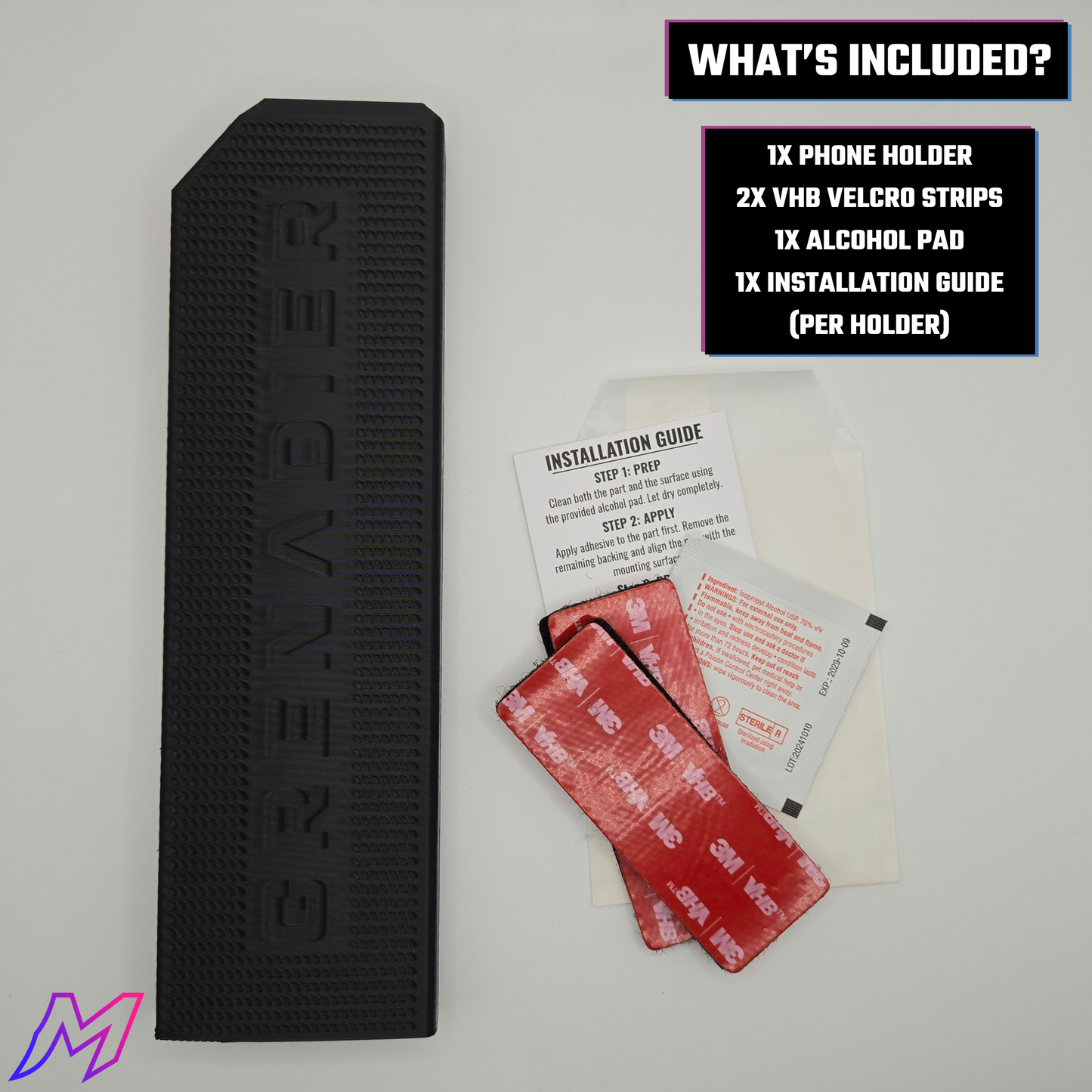 MATERIUM Grenadier phone holder package contents — holder, 2x 3M VHB velcro strips, alcohol pad, installation guide