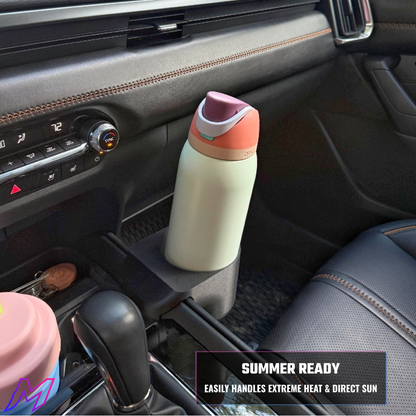 Color-changing water bottle in a car cup holder with 'Summer Ready' text.