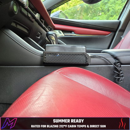 MATERIUM phone holder in Mazda3 console with phone charging — summer ready, rated for 212°F cabin temps and direct sun